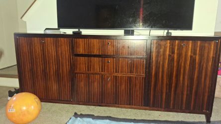 FREE Ralph Lauren E.J. Victor zebrawood TV stand.