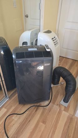 Portable air conditioner by De’Longhi Pinguino model PACAN125HPEC 12500 BTU in excellent working condition