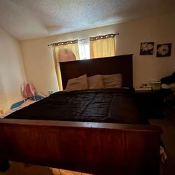 king bed with dressing and side table