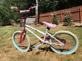 Pink and white bike