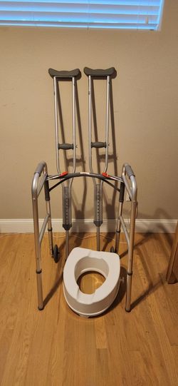 Crutches, Walker, and raised Toilet Seat