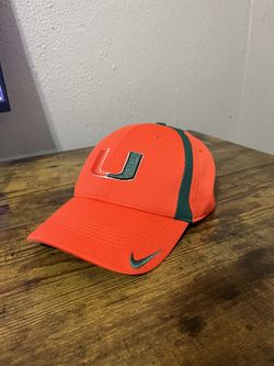 orange and green Miami Hurricanes baseball cap is a vintage Nike team cap