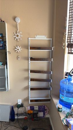 Organizing wall behind the door shelf