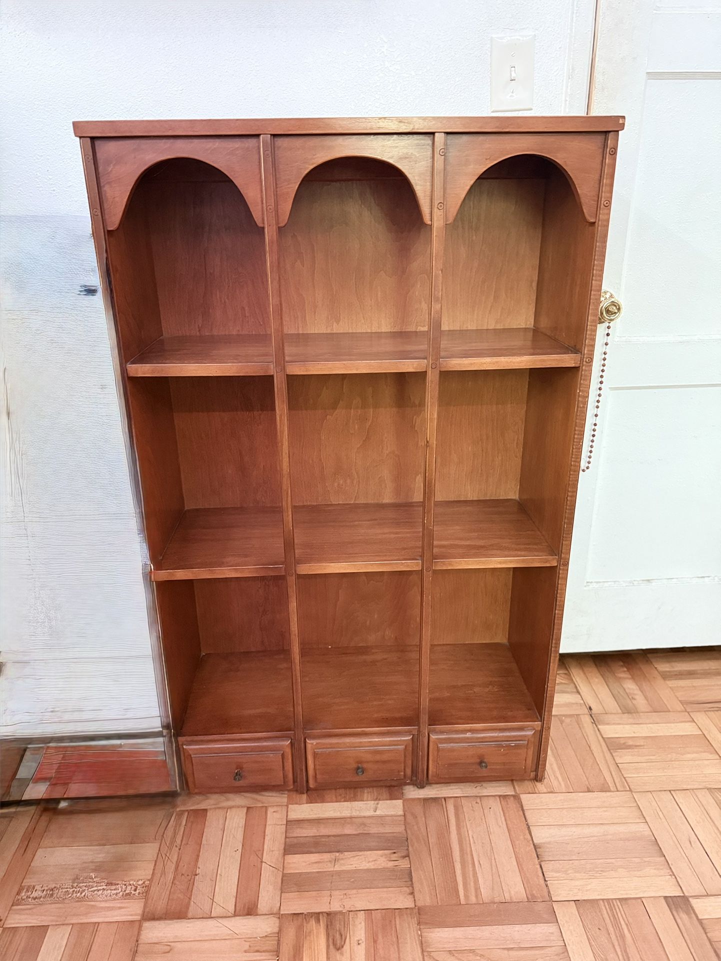 vintage wooden shelving unit