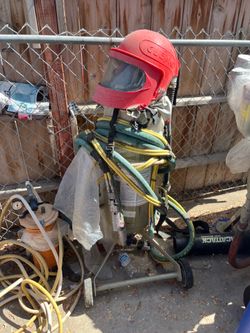 Sand blasting machine