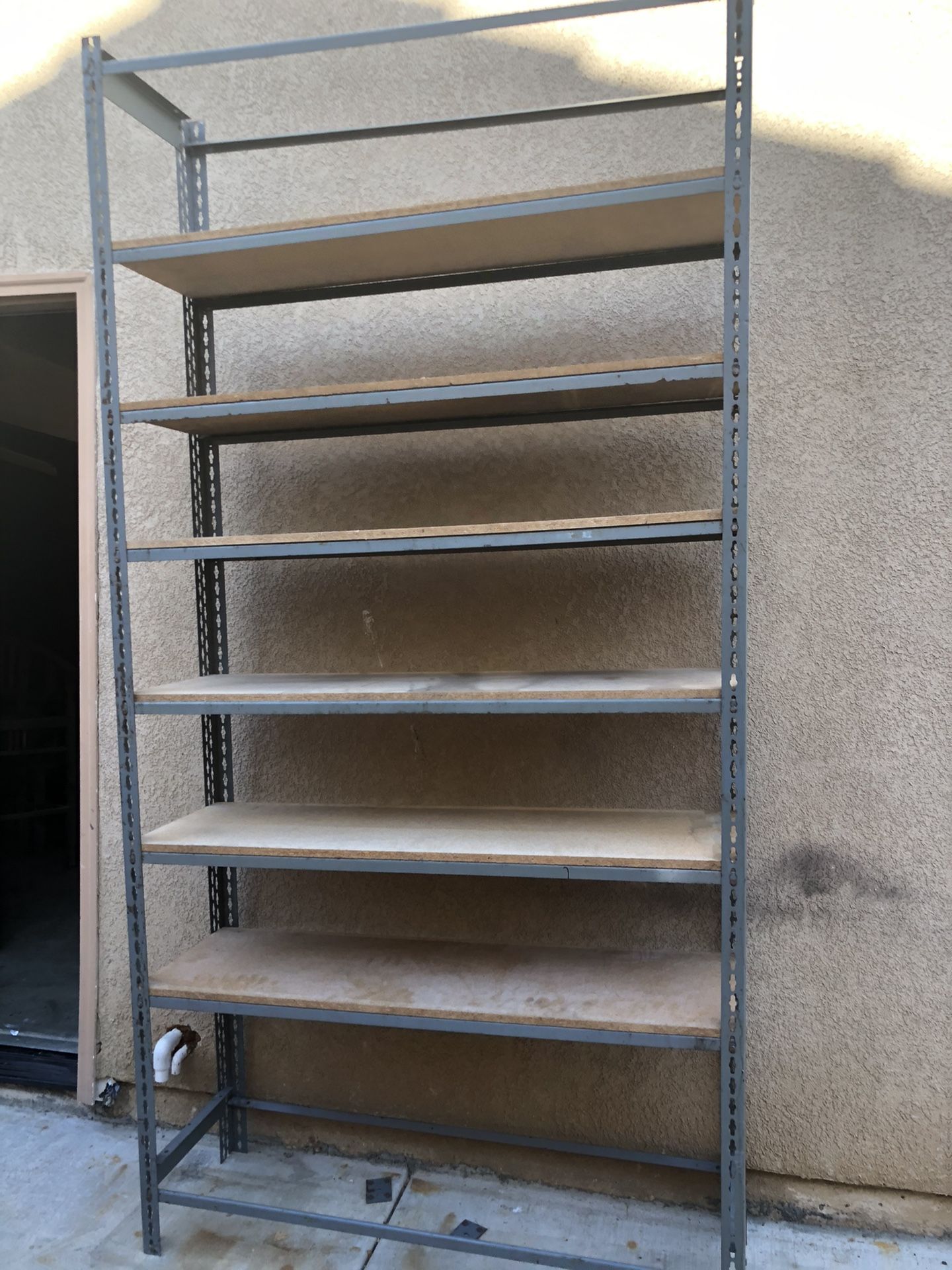 4 Tall metal shelves in good conditions