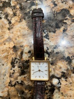 Exclusively  ecclissi gold to face brown leather strap watch women’s