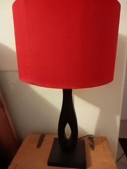 Stylish set of (2) lamps with a red shade and black base.