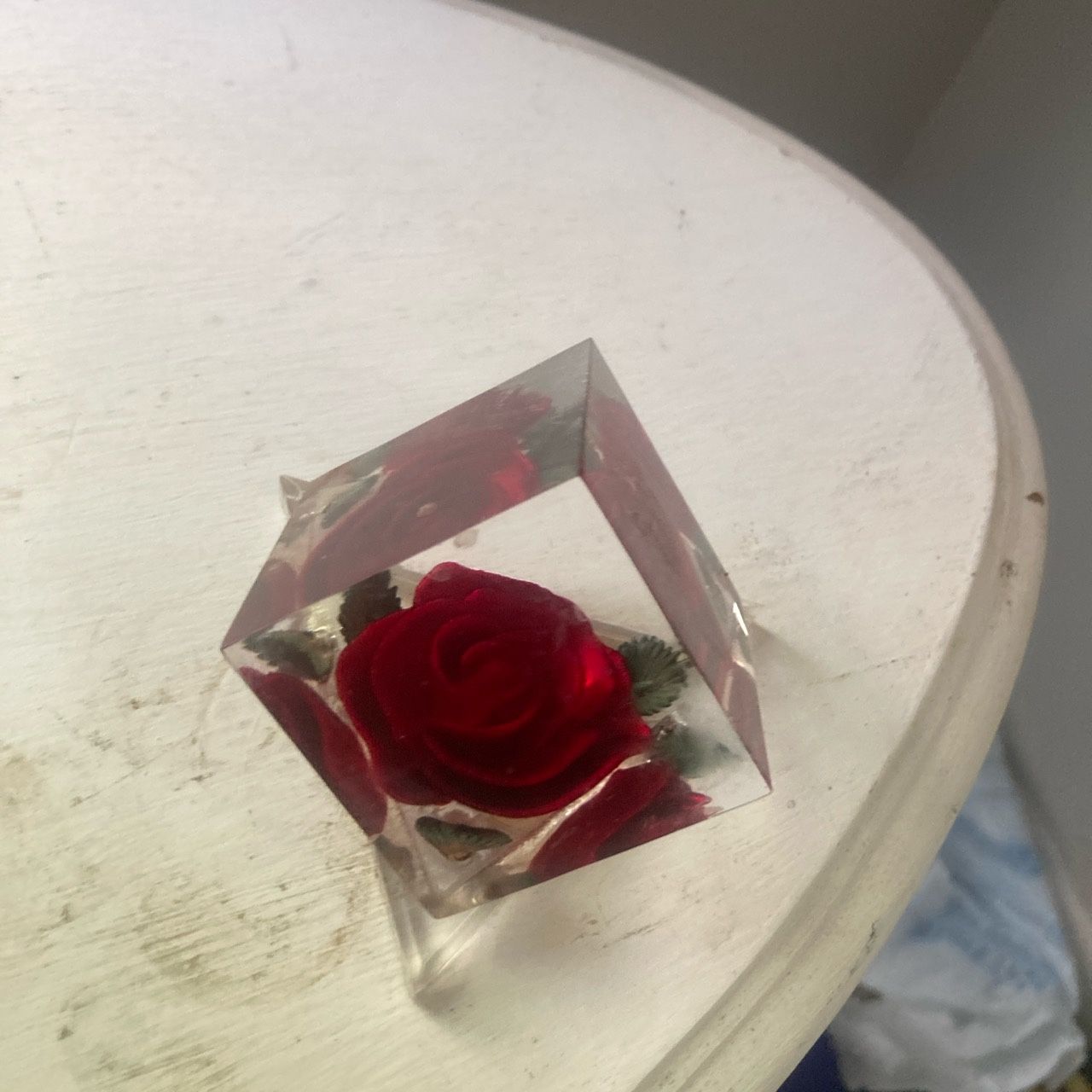 A Lucite Paperweight W/ A Rose Motif 