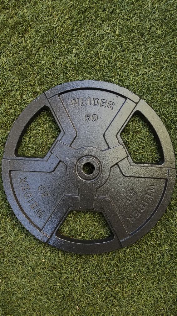 NEW 50Lb. Standard 1" Weider weight plate.