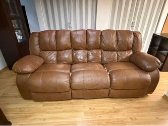 Free reclining leather sofa & loveseat