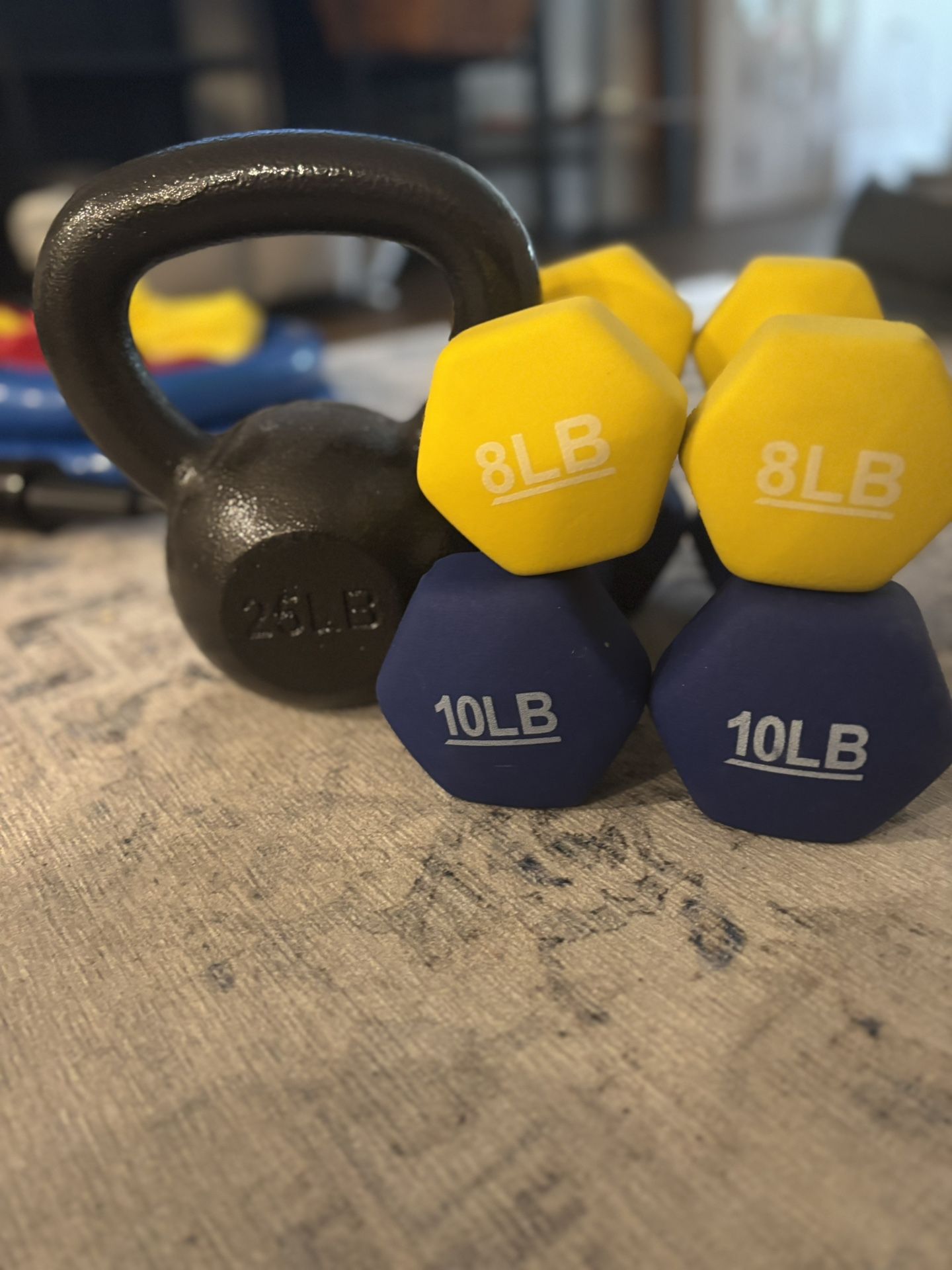 Set Of Workout Equipment (25 Lb Kettle Bell, 8lb Weight Set And 10 Lb Weight Set)