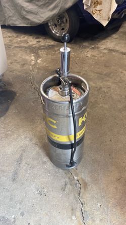 Empty bar keg with tapper