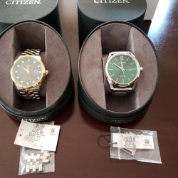 Citizen eco drive ..green one never worn the gold and silver one just got fitted were that day basically brand new you'll see