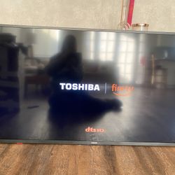For Sale Pre-owned Toshiba Smart  Fire TV 50" class LED 4K UHD 50LF621U21 with its original toshiba remote control.