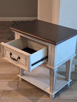 1 Sturdy Nightstand. Used, in very good condition. 

24"W x 16"D x 26.5"H

$95