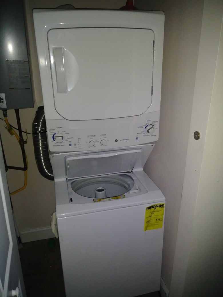 Practically Brand New. GE Unitized Spacemaker® 3.2 DOE cu. ft. Washer and 5.9 cu. ft. Gas Dryer
