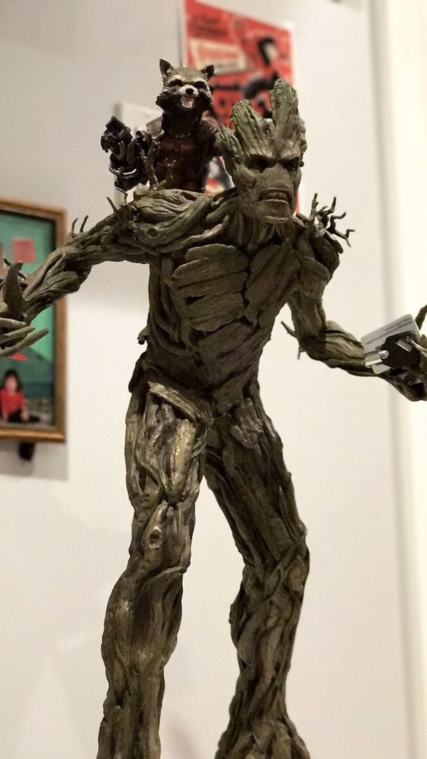 groot and rocket raccoon statue