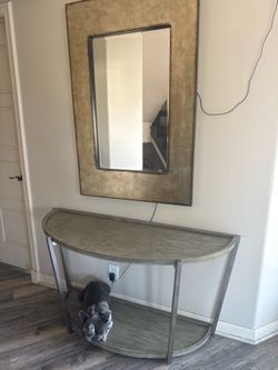 Table and mirror and picture