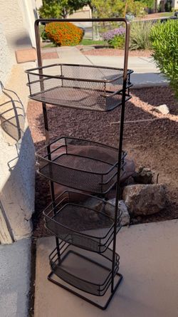 Small metal storage tower
