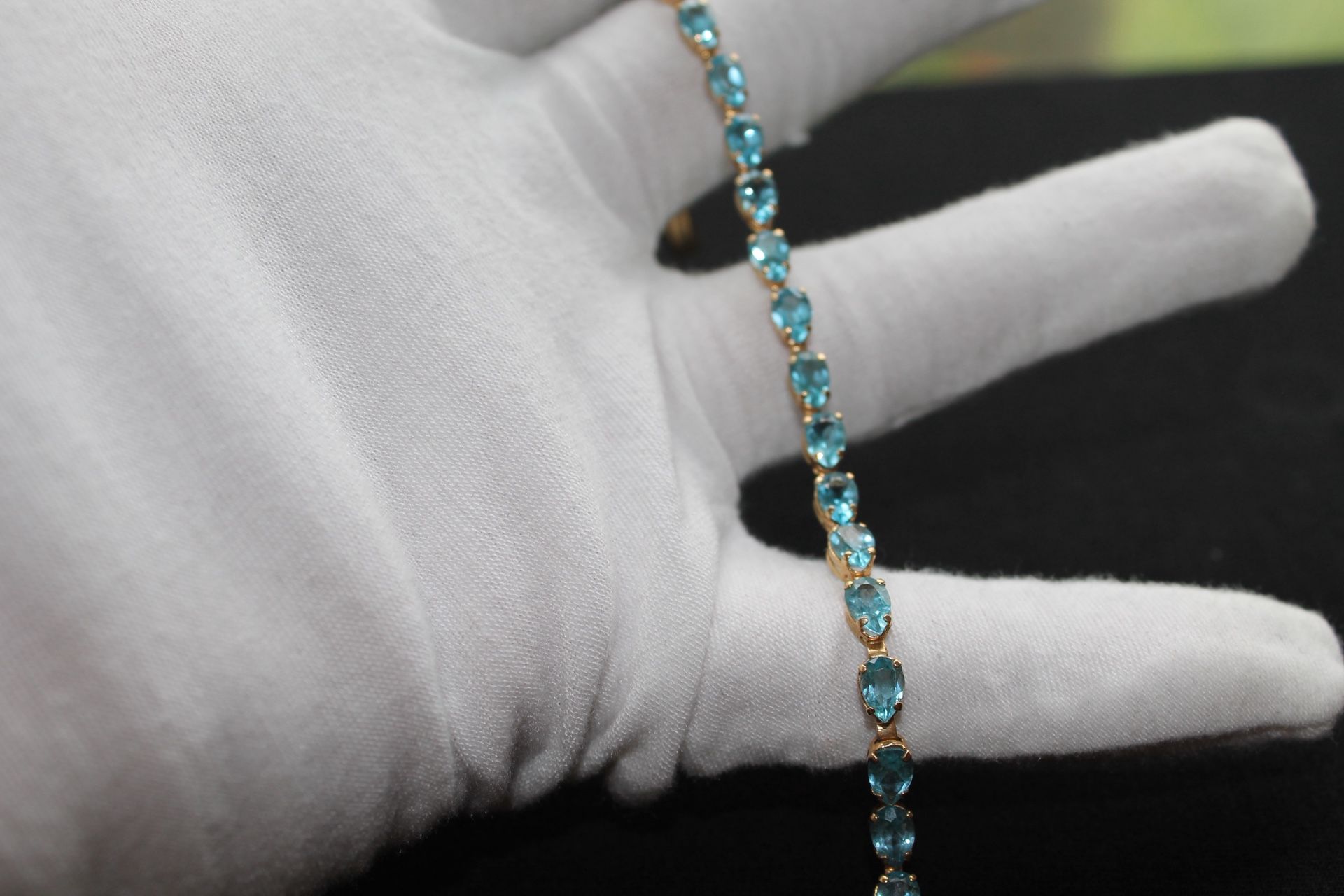 14k Swiss Topaz Tennis Bracelet 