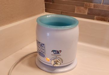Free Baby Bottle sterilizer With Purchtuase Of Bottle Warmer