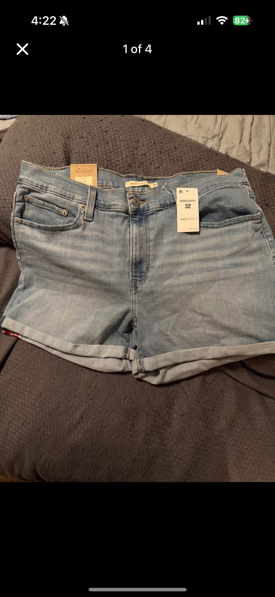 Women’s Levi mid length light blue jean shorts size 32 Brand new with tags
