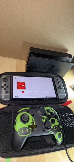 Used Nintendo Switch oled console Comes with case and nba 2k26, case docking station and charger. No trades cash only no PayPal, Venmo, or Cash app.