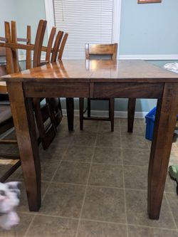 Solid oak Table 4 chairs and double bench seat