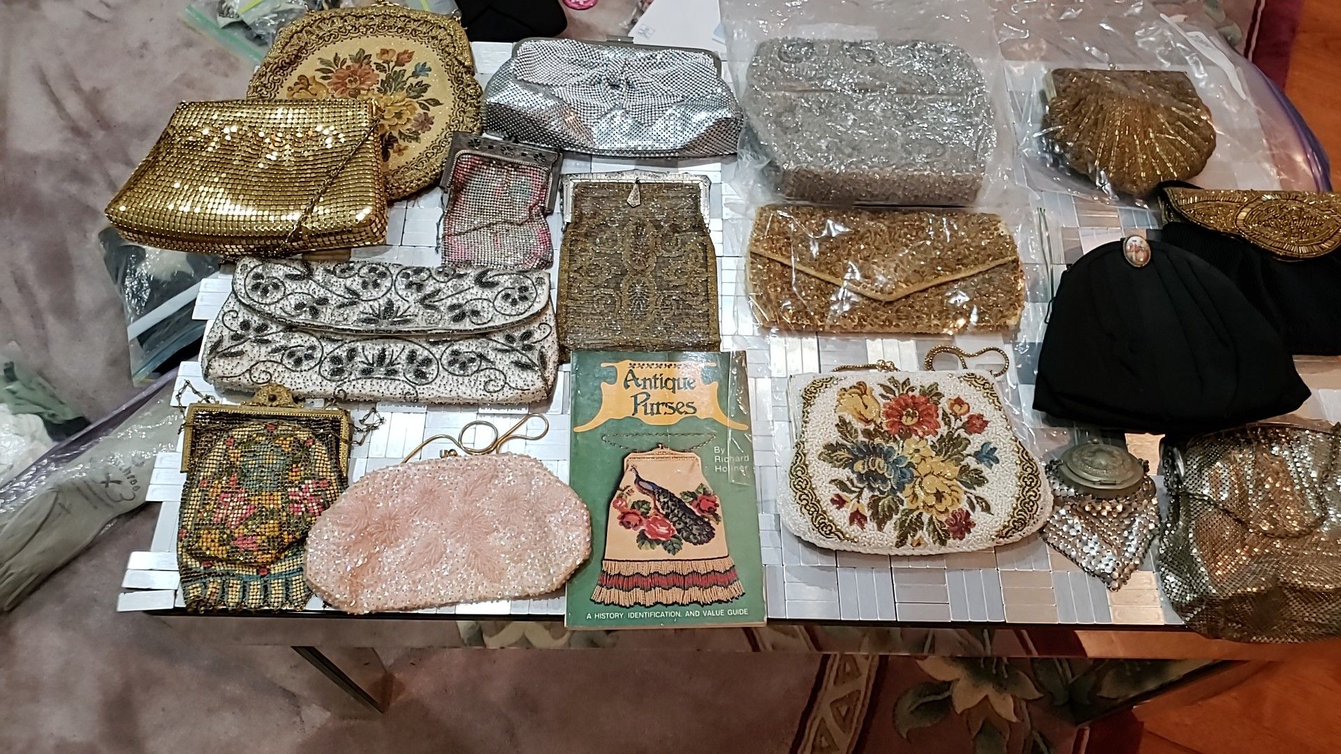 16 VINTAGE PURSES,HISTORY AND IDENTIFICATION GUIDE, 20 PAIR VINTAGE GLOVES TO INCLUDE ONE LEATHER