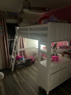 Full Size loft bed with a built-in desk and dresser