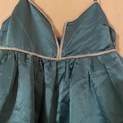 Brand new beautiful emerald green Party dress.    Rhinestone trimming. Size women’s medium 