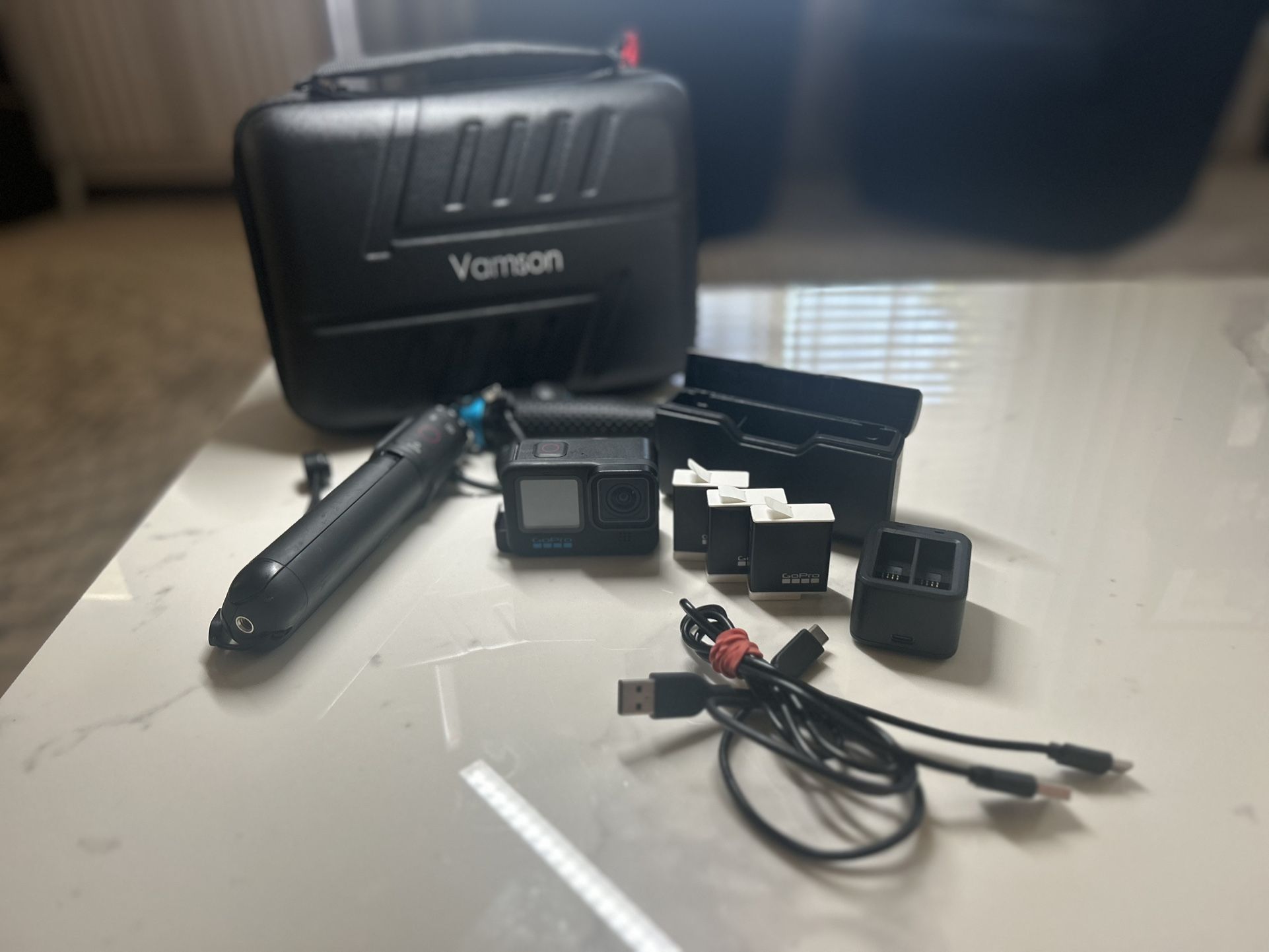 GoPro Hero 11, Vamson Protective GoPro Box,Three Batteries, Triple Charger + Duo Charger, Volta Stick, Charger Wires, GoPro Selfie Stick