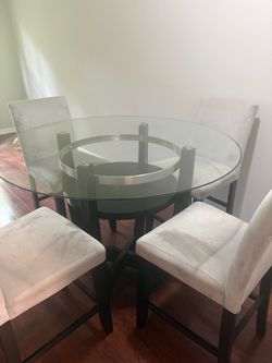 Five piece glass table set