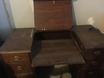 Antique sewing machine table can be used as a desk