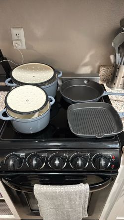 Cast iron pans/ lids gray