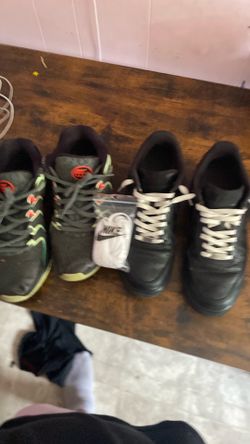Black Air Force 1s with laces and Kevin Durants