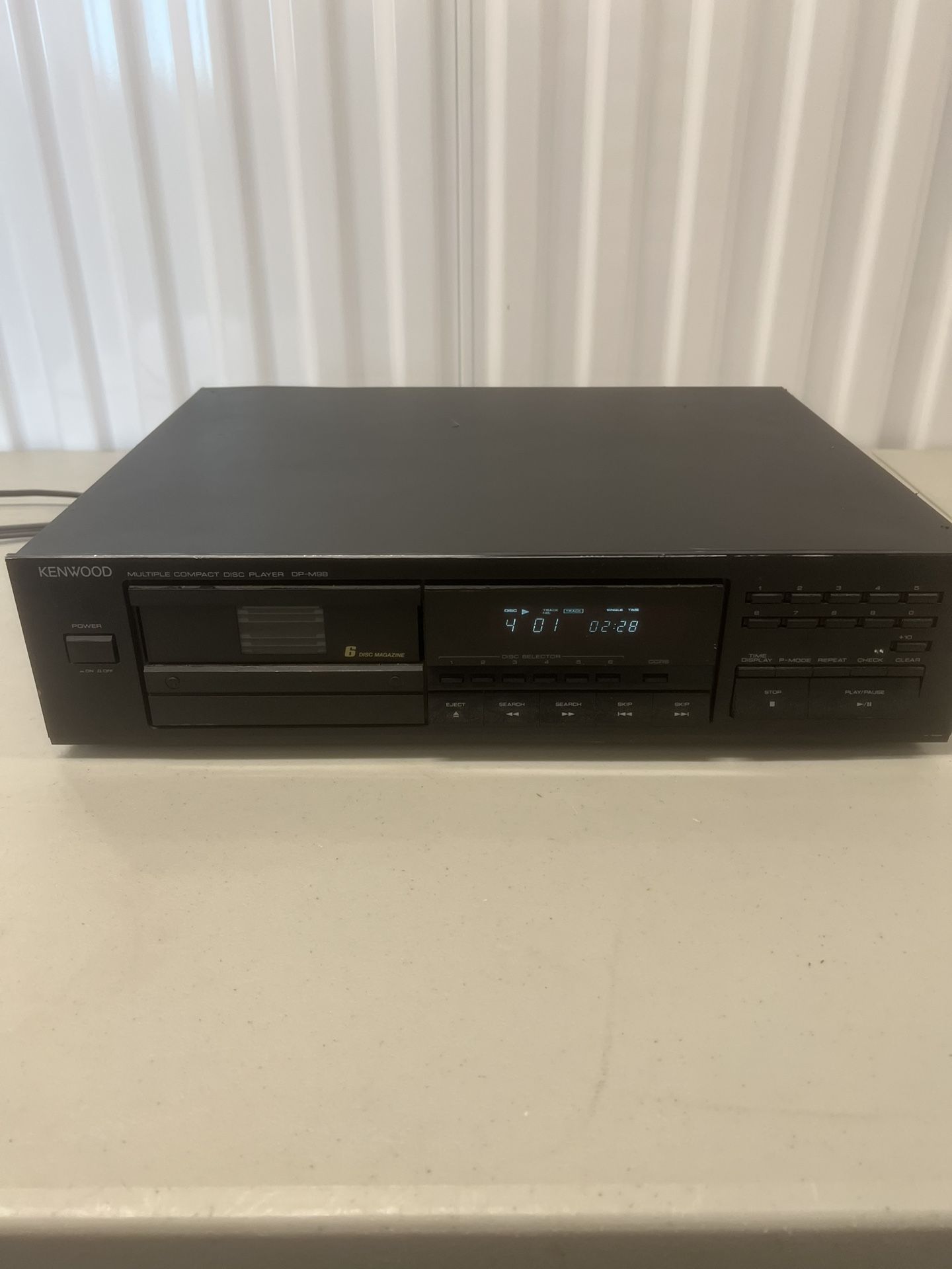 Vintage Kenwood DP-M98 Multiple Compact Disc Player 6 CD Changer. Used in good condition with some cosmetic blemishes. These blemishes are in the form