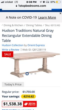 Hudson oriental extended dining table damage on corner other than that brand new one or 2 pieces need to be reattached