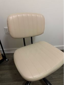 Cream rolling chair