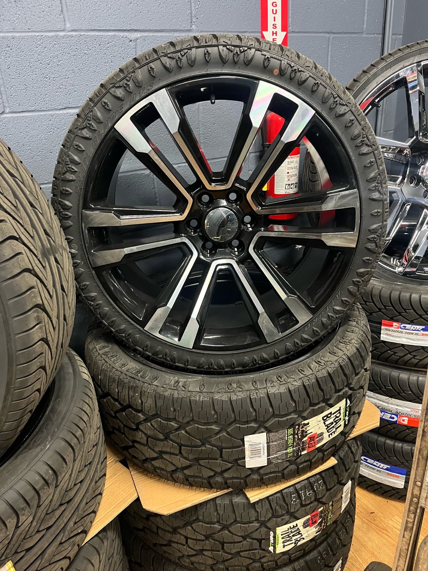 New 24 inch rims and tires all terrain