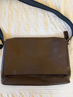 Brown leather Coach laptop messenger bag. Perfect condition.