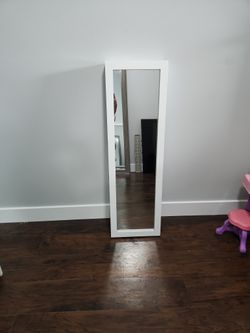 wall mirror and lockable jewelry rack