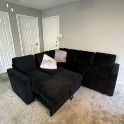 750$ black couch need gone asap MUST PICKUP SERIOUS BUYERS ONLY