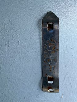 Olympia beer opener.