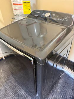 Samsung 7.4 cu. ft. Top-Load Electric Dryer with MultiSteam and Moisture Sensor.