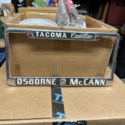 Osborne  McCann Cadillac.  Tacoma License Plate Frame
