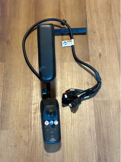 Joystick arm for electric wheelchair