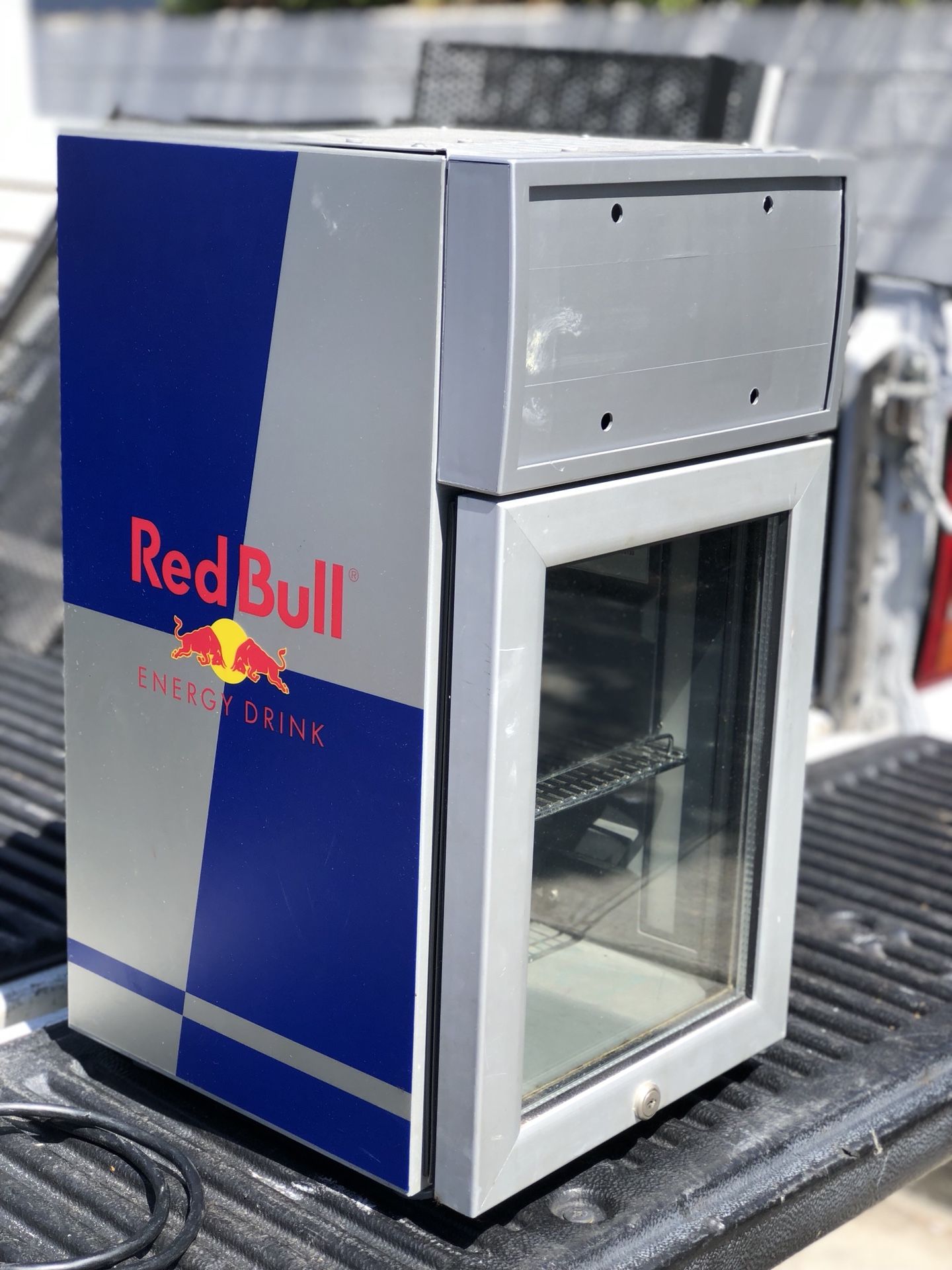 Red Bull fridge works great! Sells on eBay for $200! Give $100 and it’s yours!