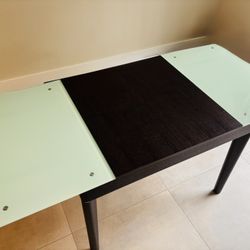 El Dorado extendable dining table w/ self-storing leaves, seats up to 8